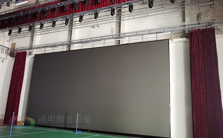 廣州黃花崗禮堂選擇通用舞臺！禮堂舞臺阻燃幕布、吊桿、舞臺燈光項目圓滿竣工！